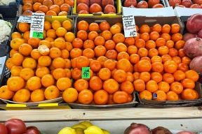Ценники на самый ходовой новогодний фрукт на минских рынках